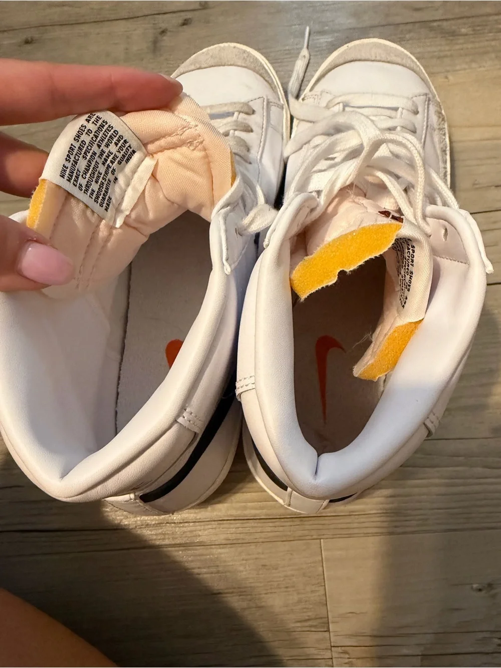 Nike Men’s White High-Top Sneakers with Black Swoosh